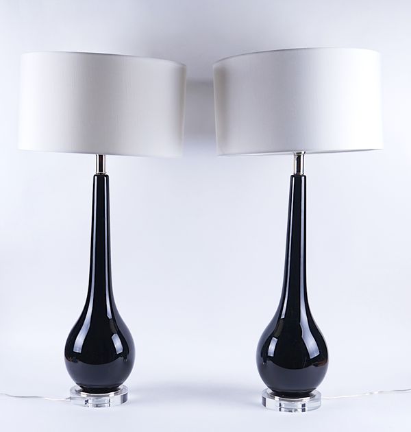 A PAIR OF DARK RED GLASS AND PERSPEX MOUNTED TABLE LAMPS (2)