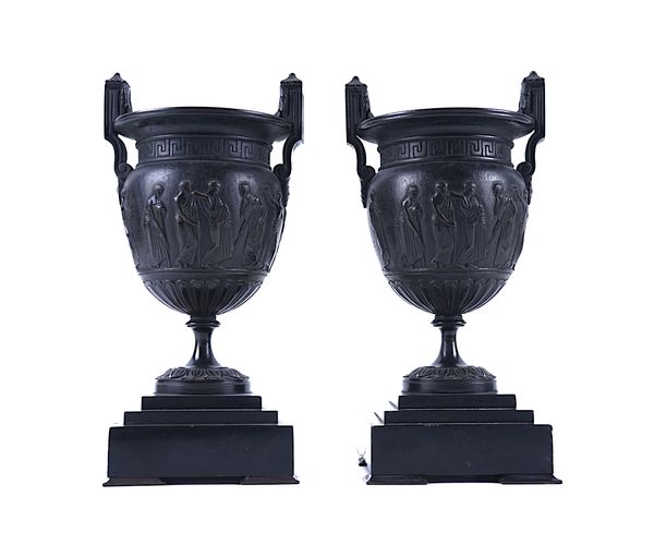 A PAIR OF FRENCH BRONZE AND BLACK MARBLE URNS (2)