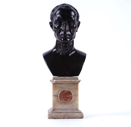 A GRAND TOUR BRONZE BUST OF A ROMAN SENATOR