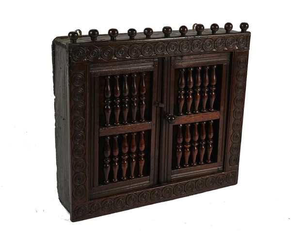 A 17TH CENTURY AND LATER OAK HANGING FOOD CUPBOARD