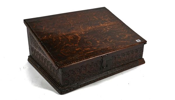 A 17TH CENTURY OAK SLOPE FRONT BIBLE BOX