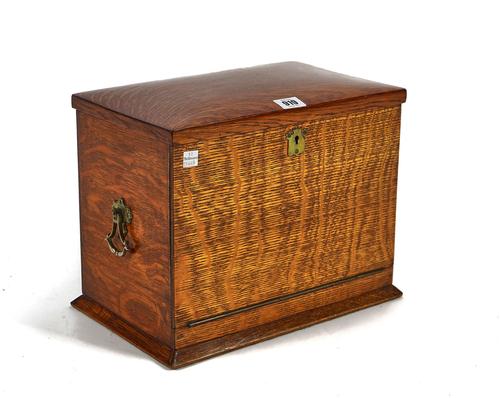 AN EARLY 20TH CENTURY OAK STATIONERY BOX