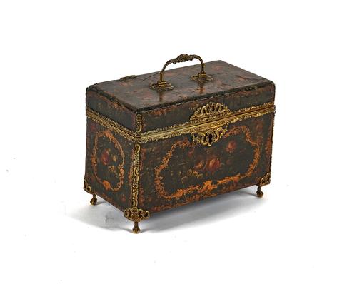 A 19TH CENTURY GILT-METAL MOUNTED JAPANNED RECTANGULAR TEA CADDY