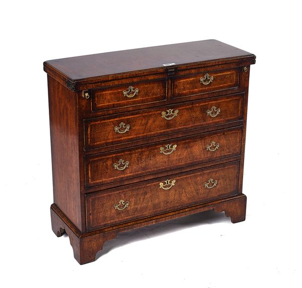 AN ADAPTED 18TH CENTURY FEATHER BANDED WALNUT BACHELOR’S CHEST