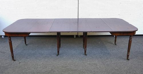 A REGENCY MAHOGANY D-END EXTENDING DINING TABLE