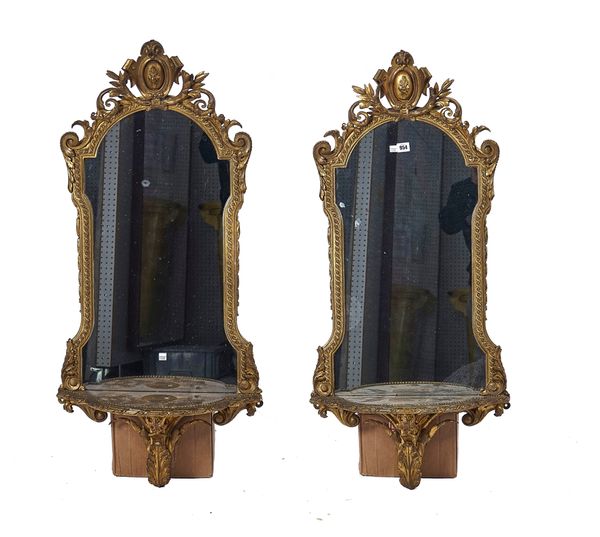 G.NOSOTTI CARVER AND GUILDER OXFORD STREET; A PAIR OF 19TH CENTURY GILT FRAMED MIRRORS (2)
