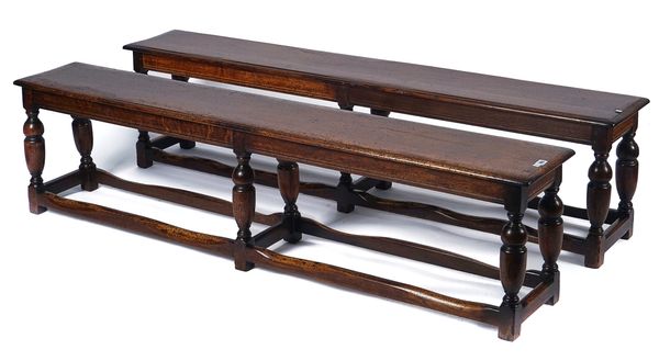 A PAIR OF 17TH CENTURY STYLE OAK BENCHES (2)