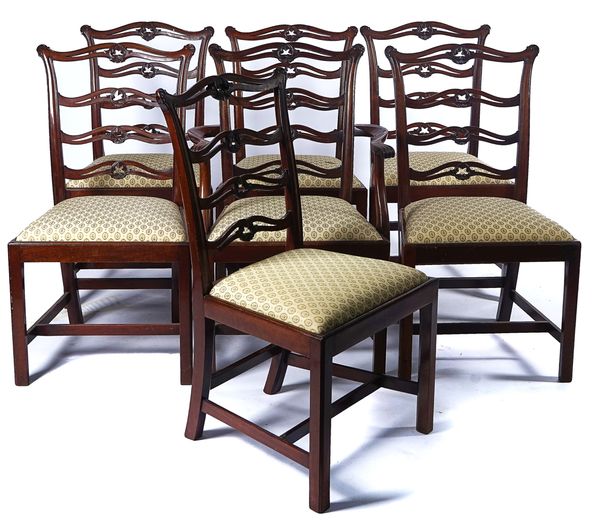 A SET OF SEVEN GEORGE II STYLE MAHOGANY RIBBON-BACK DINING CHAIRS (7)