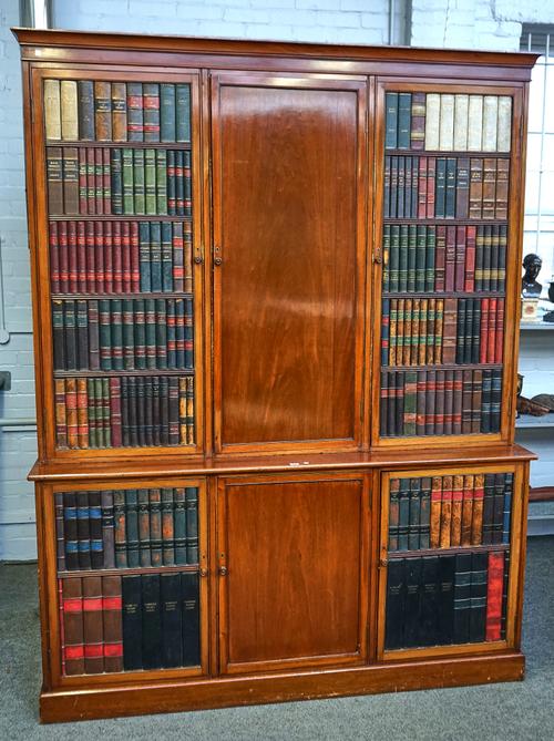 A VICTORIAN MAHOGANY DOUBLE HEIGHT CABINET