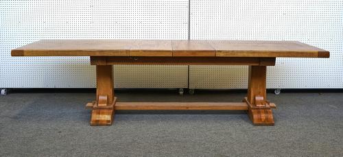 A 17TH CENTURY STYLE OAK DRAW LEAF DINING TABLE