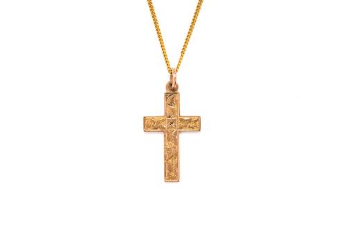 A 9CT GOLD PENDANT CROSS WITH A NECKCHAIN (2)