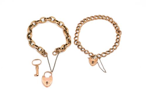 TWO GOLD CURB LINK BRACELETS WITH HEART SHAPED PADLOCK CLASPS AND A GOLD KEY (3)