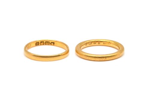 TWO 22CT GOLD PLAIN WEDDING RINGS (2)