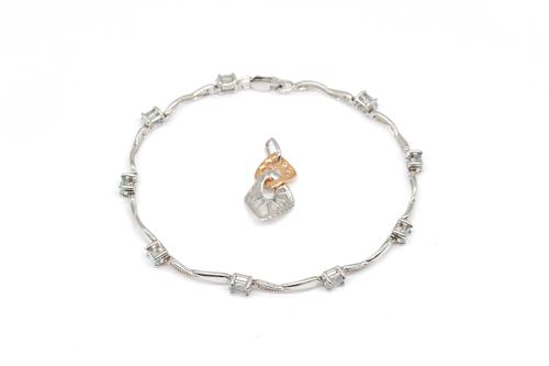A  WHITE GOLD, AQUAMARINE AND DIAMOND BRACELET AND A DIAMOND PENDANT (2)