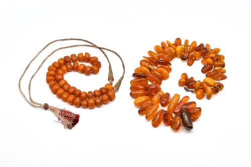 TWO AMBER BEAD NECKLACES (2)