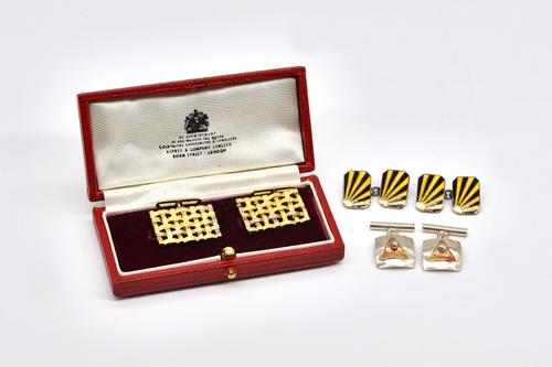 A PAIR OF SILVER AND ENAMELLED CUFFLINKS AND TWO FURTHER PAIRS OF CUFFLINKS (3)