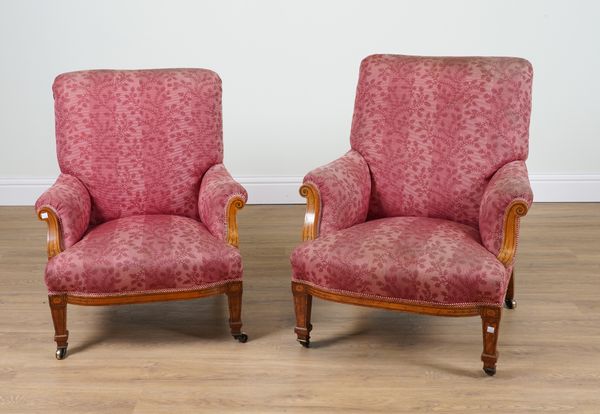 A GRADUATED PAIR OF 19TH CENTURY MARQUETRY INLAID SATINWOOD EASY ARMCHAIRS (2)