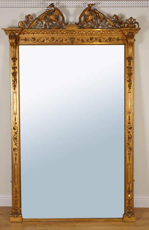 A LARGE GILT FRAMED MIRROR WITH OPPOSING ‘HO-HO’ BIRD CREST