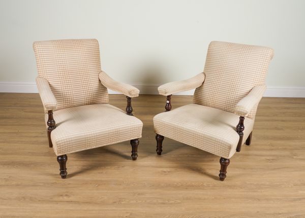 A PAIR OF LATE 19TH CENTURY MAHOGANY FRAMED OPEN ARM EASY CHAIRS (2)