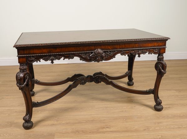 A GEORGE II STYLE RECTANGULAR CARVED WALNUT CENTRE TABLE