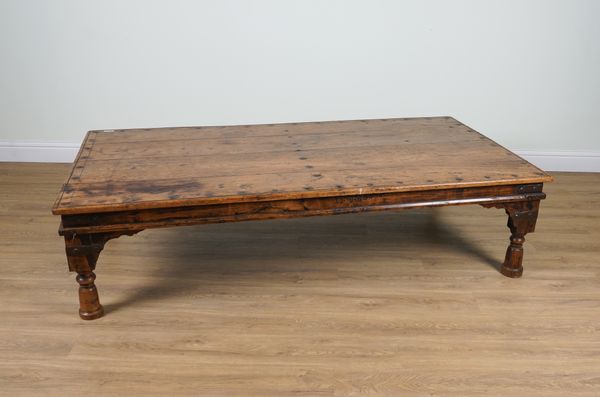 A LARGE METALBOUND INDIAN TEAK RECTANGULAR COFFEE TABLE