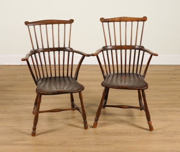 A PAIR OF 19TH CENTURY ELM AND BEECH COMB BACK CHAIRS (2)