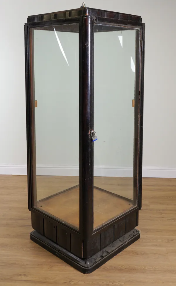 AN ART DECO EBONISED SQUARE FREE-STANDING DISPLAY CABINET