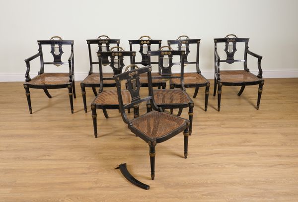 A SET OF EIGHT REGENCY AND LATER GILT METAL MOUNTED EBONISED CANE SEAT DINING CHAIRS (8)