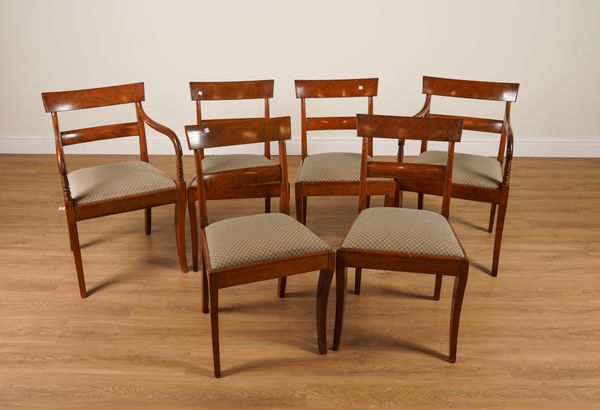 A SET OF SIX EARLY 19TH CENTURY FRENCH MAHOGANY SABRE LEGGED DINING CHAIRS (6)