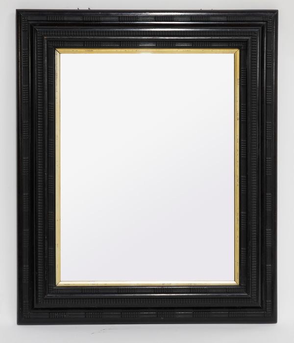 A 19TH CENTURY DUTCH EBONY VENEERED RIPPLE FRAME MIRROR