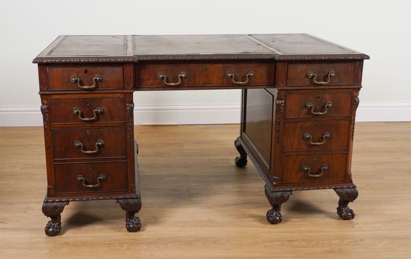 SIMPOLES LTD MANCHESTER; A LATE 19TH CENTURY CARVED MAHOGANY INVERTED BREAKFRONT PEDESTAL DESK