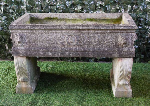 A RECTANGULAR FOLIATE CAST RECONSTITUTED STONE PLANTER