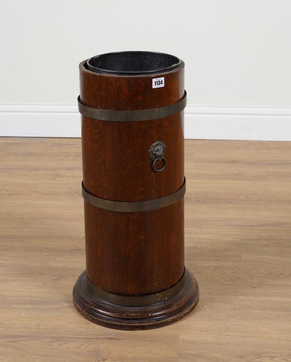 AN EARLY 20TH CENTURY BRASS BOUND COOPER MADE OAK CYLINDRICAL STICK STAND