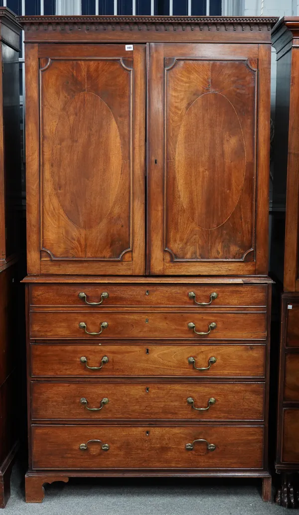 A GEORGE III MAHOGANY LINEN PRESS SECRETAIRE CHEST