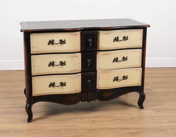 A FRENCH STYLE EBONISED AND CREAM PAINTED NINE DRAWER CHEST OF DRAWERS