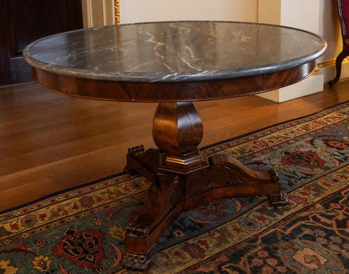 A CHARLES X BLEU TURQUIN MARBLE MOUNTED MAHOGANY GUERIDON CENTRE TABLE
