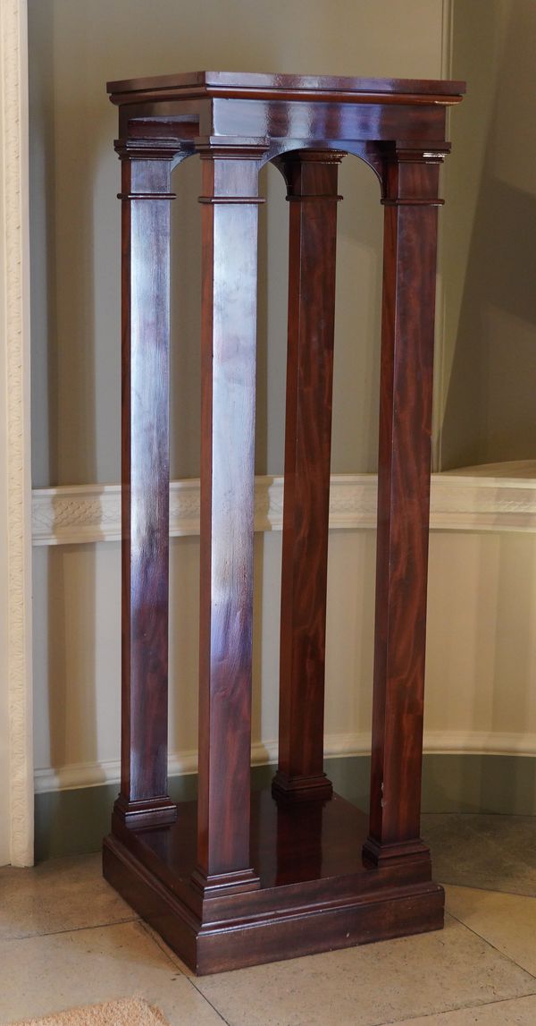 A REGENCY STYLE MAHOGANY TABLE LEAF HUTCH LATER CONVERTED TO AN OPEN COAT HANGER