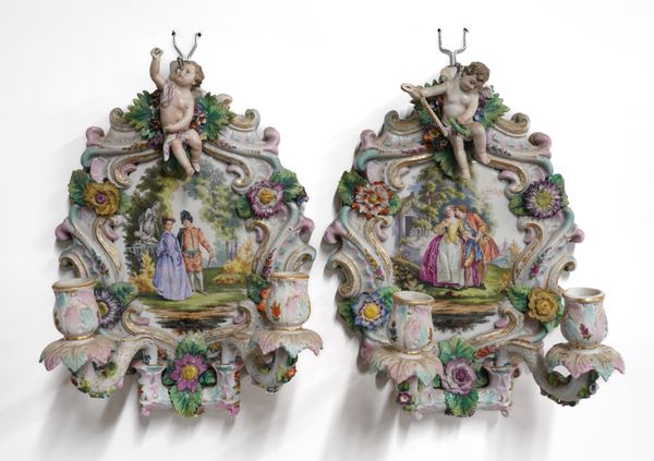 A PAIR OF GERMAN PORCELAIN TWIN-LIGHT CANDLE SCONCES