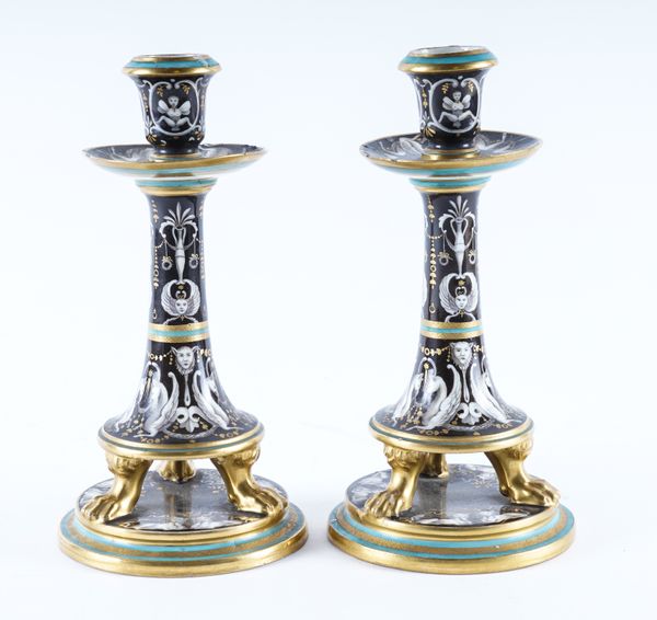 A PAIR OF UNUSUAL VIENNA PORCELAIN CANDLESTICKS (2)