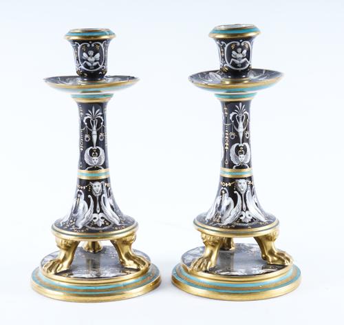 A PAIR OF UNUSUAL VIENNA PORCELAIN CANDLESTICKS (2)