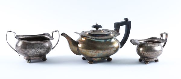 A SILVER THREE PIECE TEA SET