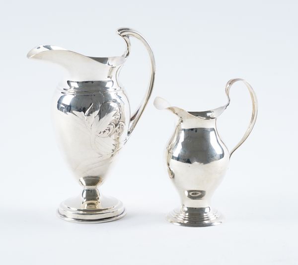 TWO SILVER CREAM JUGS (2)