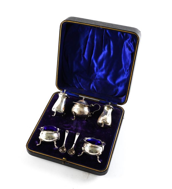 A SILVER CONDIMENT SET