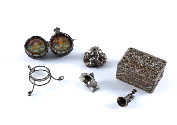 A RUSSIAN SILVER FILIGREE AND PAINTED LACQUER EGG SHAPED ORNAMENT, WITH A STAND AND FOUR FURTHER ITEMS (6)