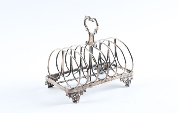 A VICTORIAN SILVER SEVEN BAR TOASTRACK