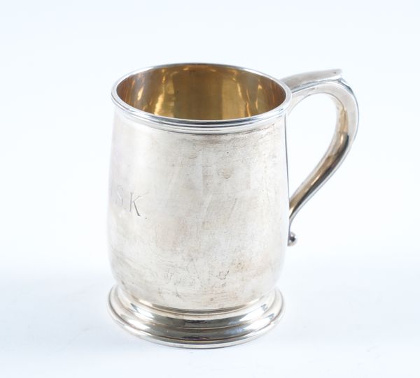 A SILVER MUG