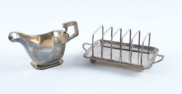 A SILVER TOASTRACK AND A SILVER SAUCEBOAT (2)