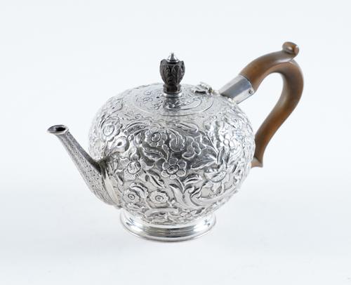 A GEORGE I SILVER TEAPOT