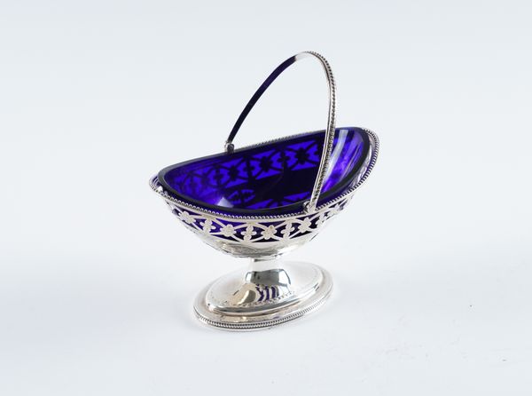 A GEORGE III SILVER SUGAR BASKET