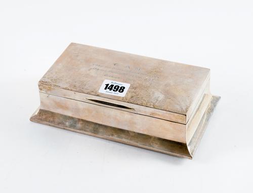 A SILVER RECTANGULAR TABLE CIGARETTE BOX